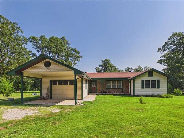 15.8 Acres of Land with Home for Sale in Flemington, Missouri