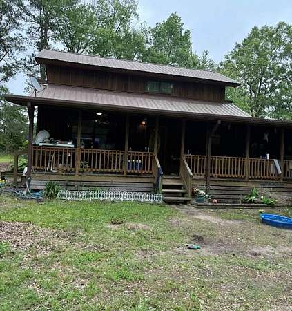 6.74 Acres of Land with Home for Sale in Nashville, Arkansas