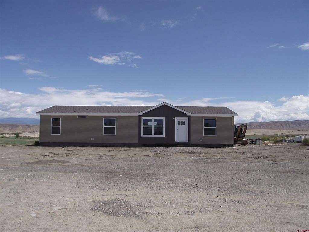 1.84 Acres of Land with Home for Sale in Delta, Colorado
