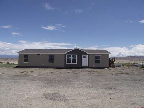 1.84 Acres of Land with Home for Sale in Delta, Colorado
