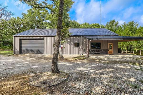 5.53 Acres of Land with Home for Sale in Quinlan, Texas