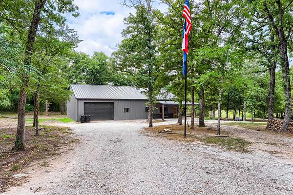 5.53 Acres of Land with Home for Sale in Quinlan, Texas