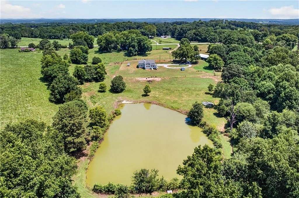 12.4 Acres of Land with Home for Sale in Carnesville, Georgia