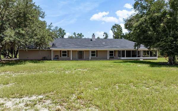 10.8 Acres of Land with Home for Sale in Mayo, Florida