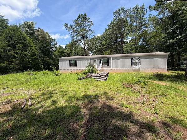 1.5 Acres of Land with Home for Sale in Brundidge, Alabama