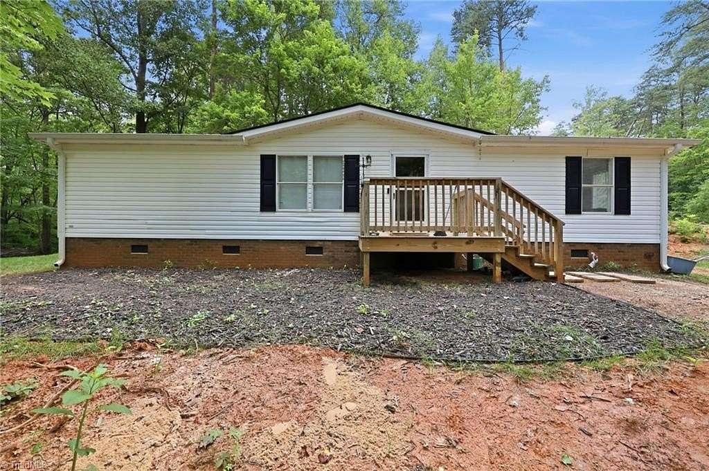 1.77 Acres of Land with Home for Sale in Walkertown, North Carolina