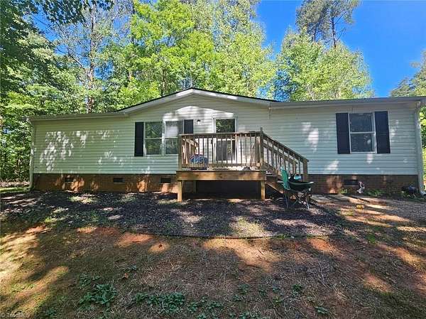 1.77 Acres of Land with Home for Sale in Walkertown, North Carolina