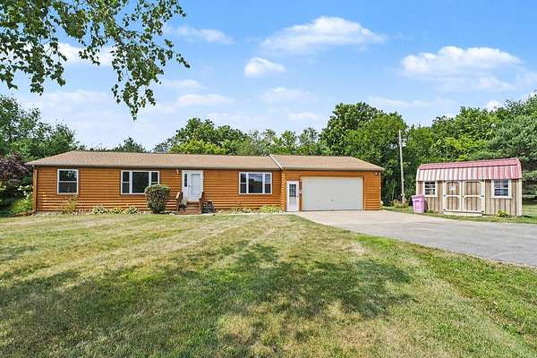 2 Acres of Land with Home for Sale in Lake Odessa, Michigan
