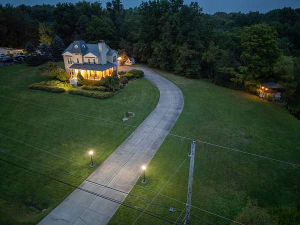 4.22 Acres of Land with Home for Auction in Vienna, Ohio