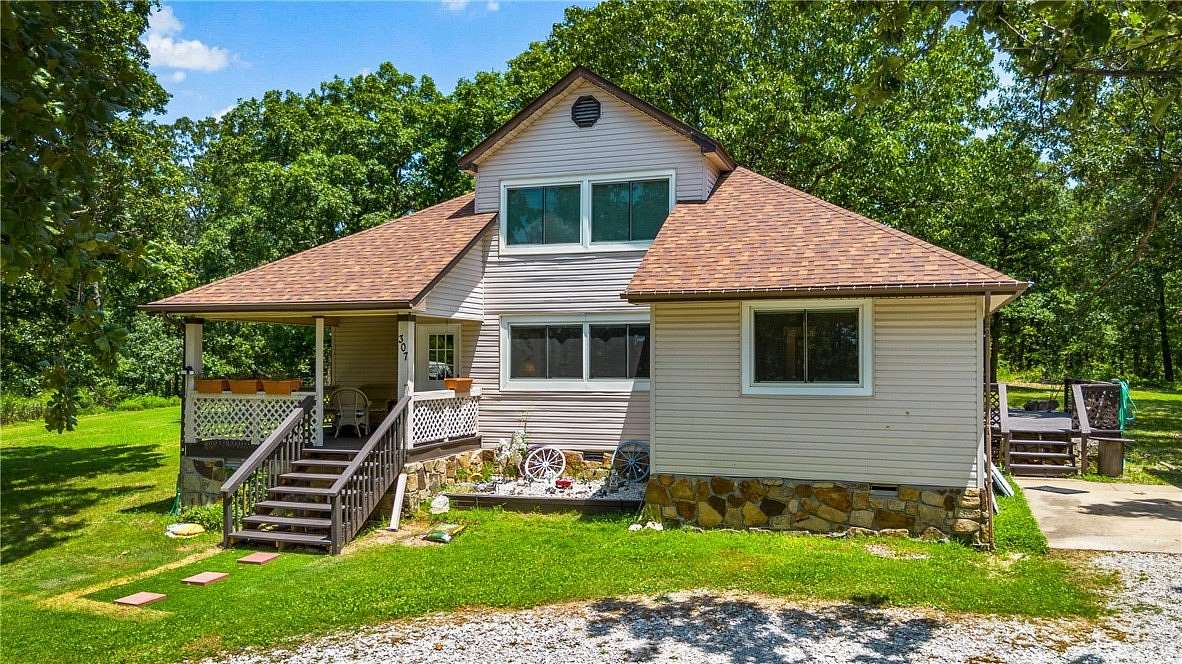 5 Acres of Land with Home for Sale in Green Forest, Arkansas