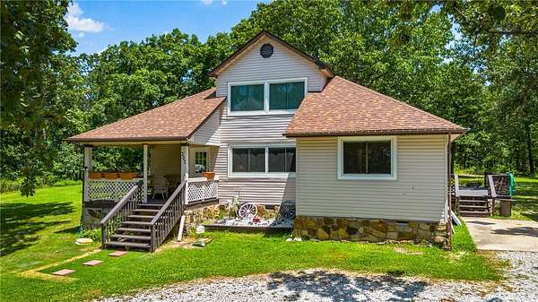 5 Acres of Land with Home for Sale in Green Forest, Arkansas