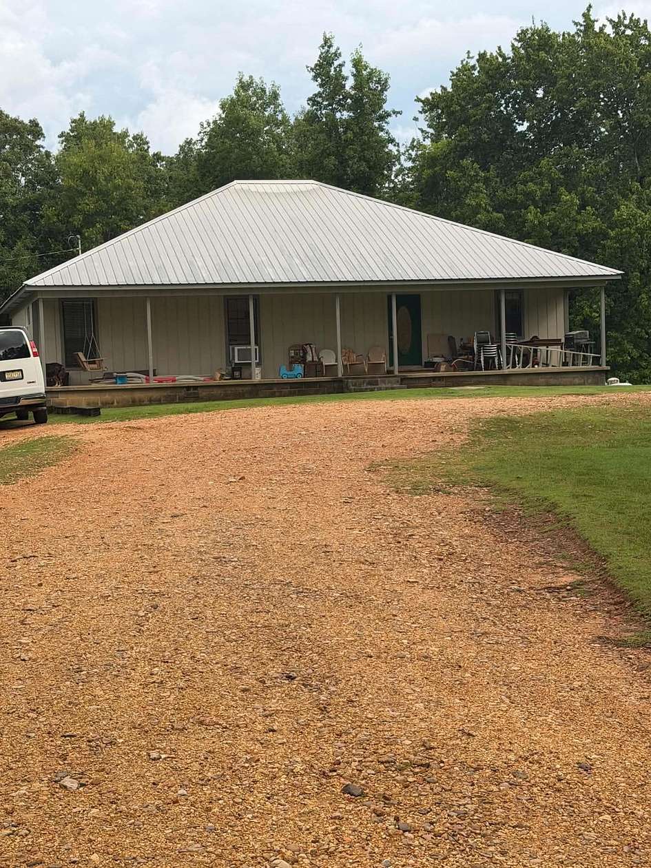 66 Acres of Land with Home for Sale in Russellville, Alabama