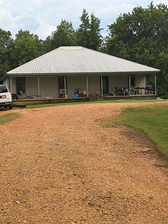 66 Acres of Land with Home for Sale in Russellville, Alabama