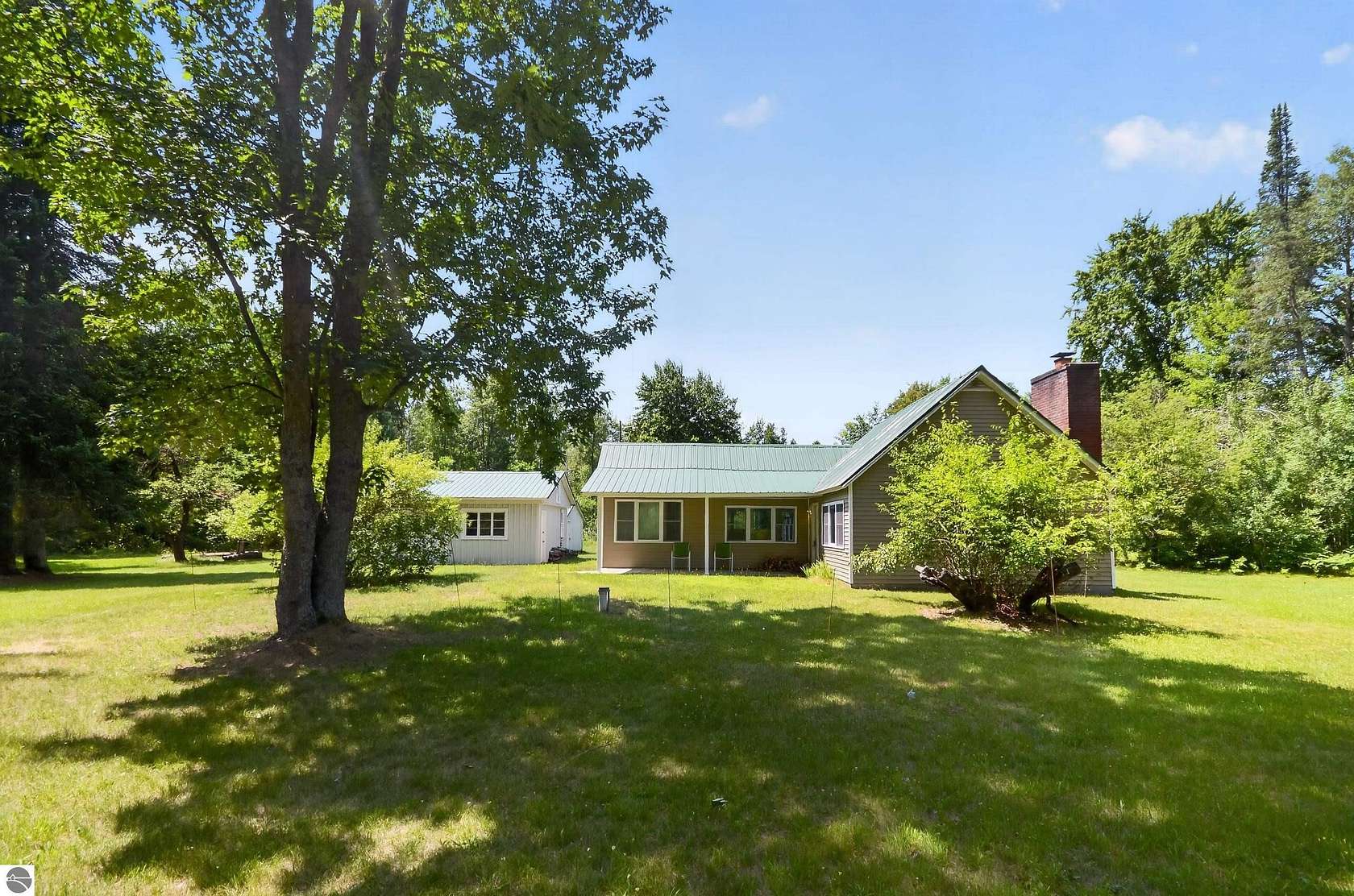 80 Acres of Recreational Land with Home for Sale in Turner, Michigan