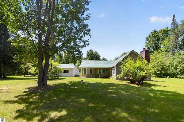 80 Acres of Recreational Land with Home for Sale in Turner, Michigan