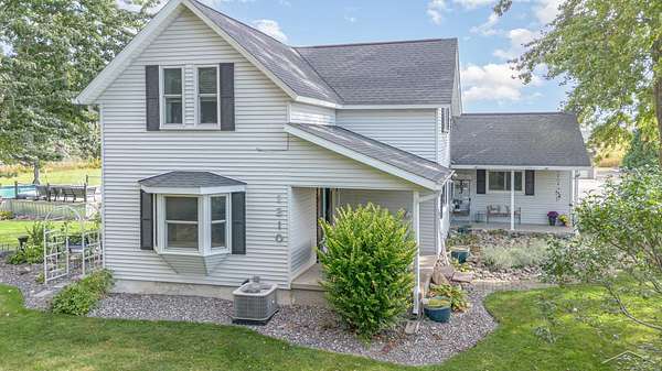 1.5 Acres of Land with Home for Sale in Merrill, Michigan