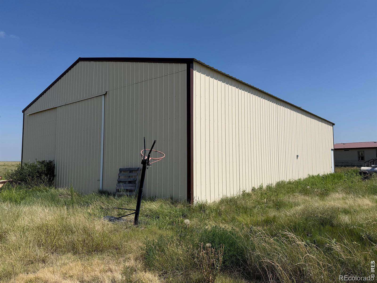 25 Acres of Land with Home for Sale in Idalia, Colorado