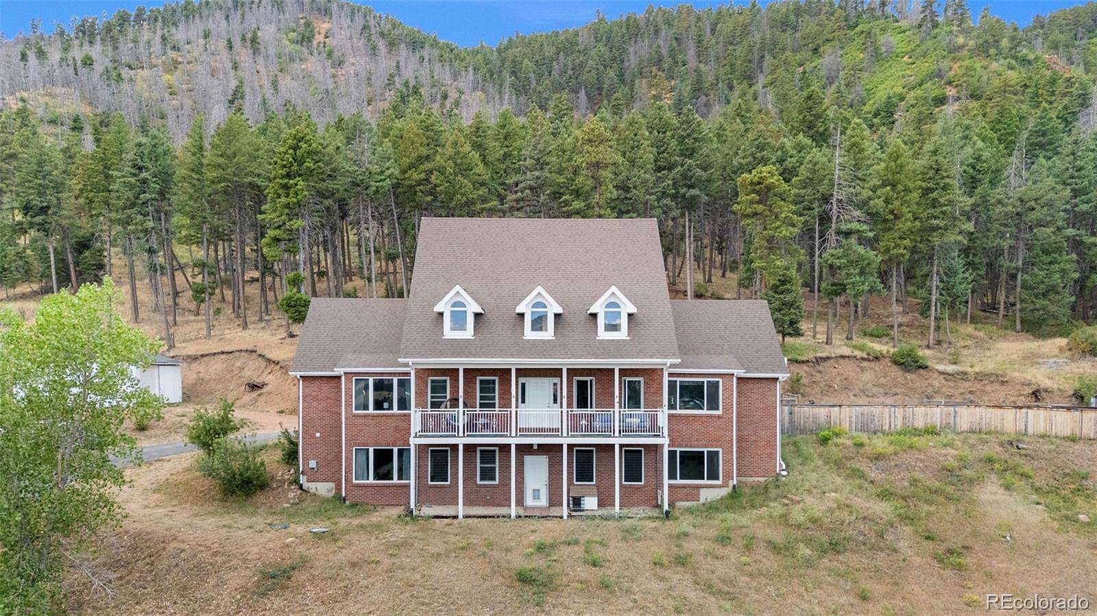 10.4 Acres of Recreational Land with Home for Sale in Larkspur, Colorado