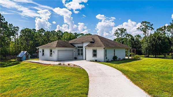 5 Acres of Land with Home for Sale in Palm City, Florida