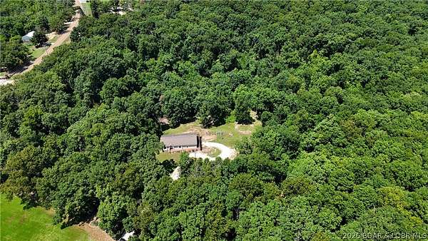 7 Acres of Land with Home for Sale in Eldon, Missouri