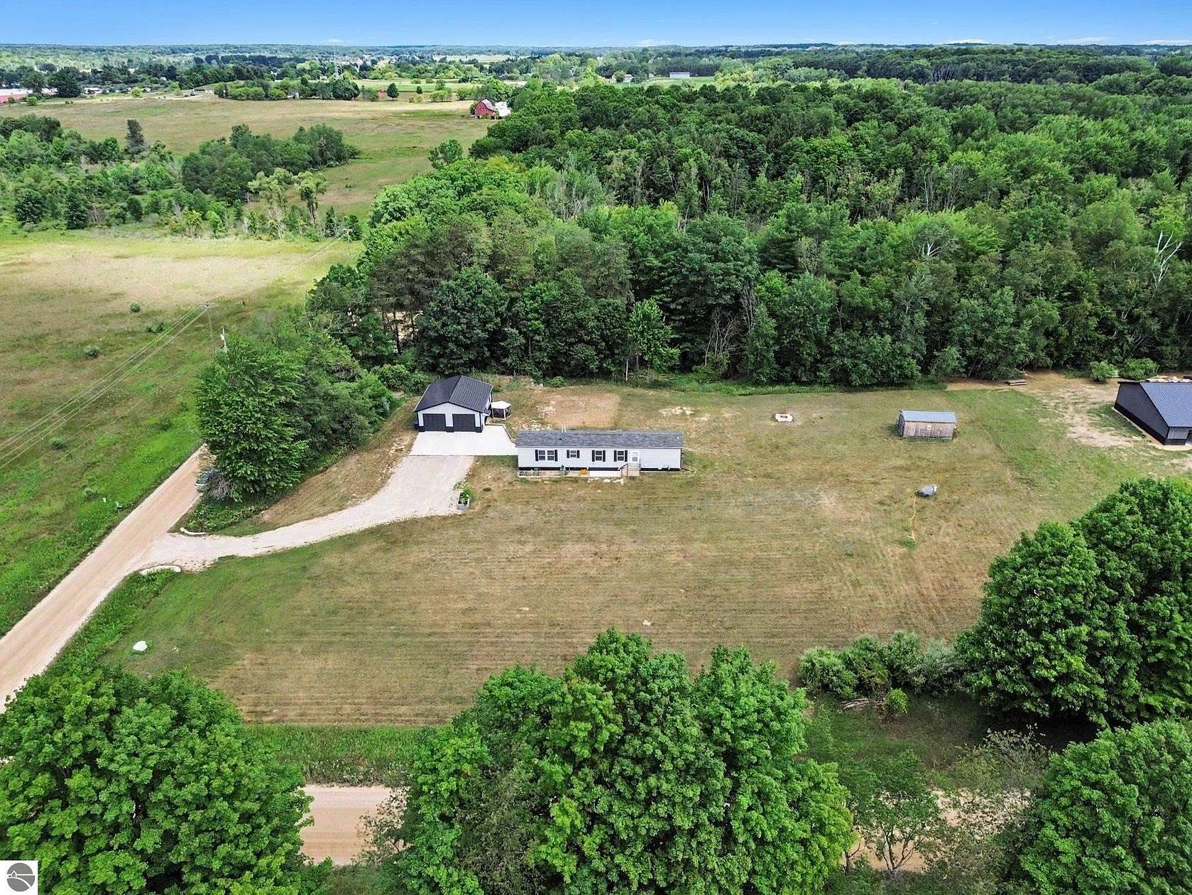 2.35 Acres of Land with Home for Sale in Shepherd, Michigan