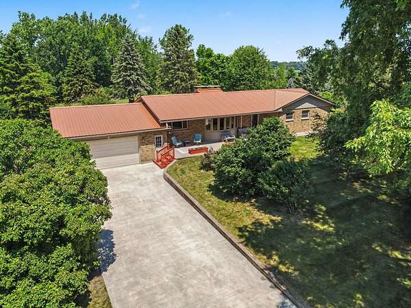 20 Acres of Recreational Land with Home for Sale in Lake Odessa, Michigan