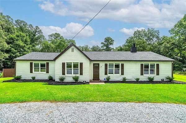 8.6 Acres of Land with Home for Sale in Ellenwood, Georgia