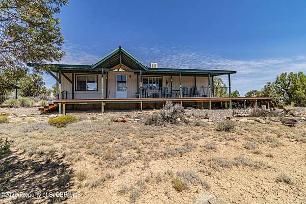 10 Acres of Land with Home for Sale in Navajo City, New Mexico
