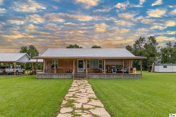 11.5 Acres of Land with Home for Sale in Oak Grove, Louisiana