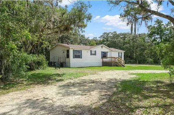 5 Acres of Land with Home for Auction in Dunnellon, Florida