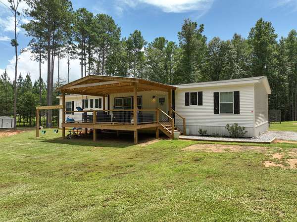 6 Acres of Land with Home for Sale in Titus, Alabama