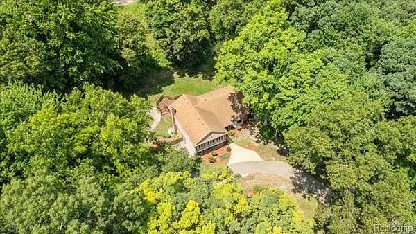 1.55 Acres of Land with Home for Sale in Hamburg Township, Michigan