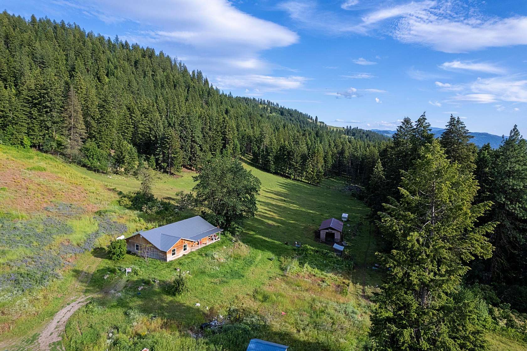 20 Acres of Recreational Land with Home for Sale in Evans, Washington