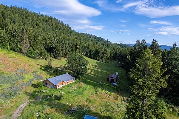 20 Acres of Recreational Land with Home for Sale in Evans, Washington