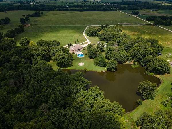 18 Acres of Land with Home for Sale in Amoret, Missouri