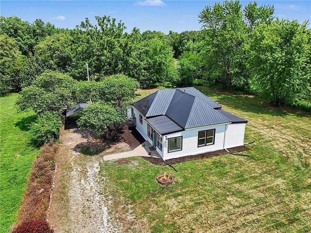 6.38 Acres of Land with Home for Sale in Smithville, Missouri