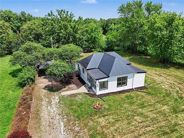 6.38 Acres of Land with Home for Sale in Smithville, Missouri