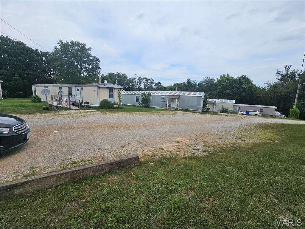 1.54 Acres of Land with Home for Sale in St. Robert, Missouri