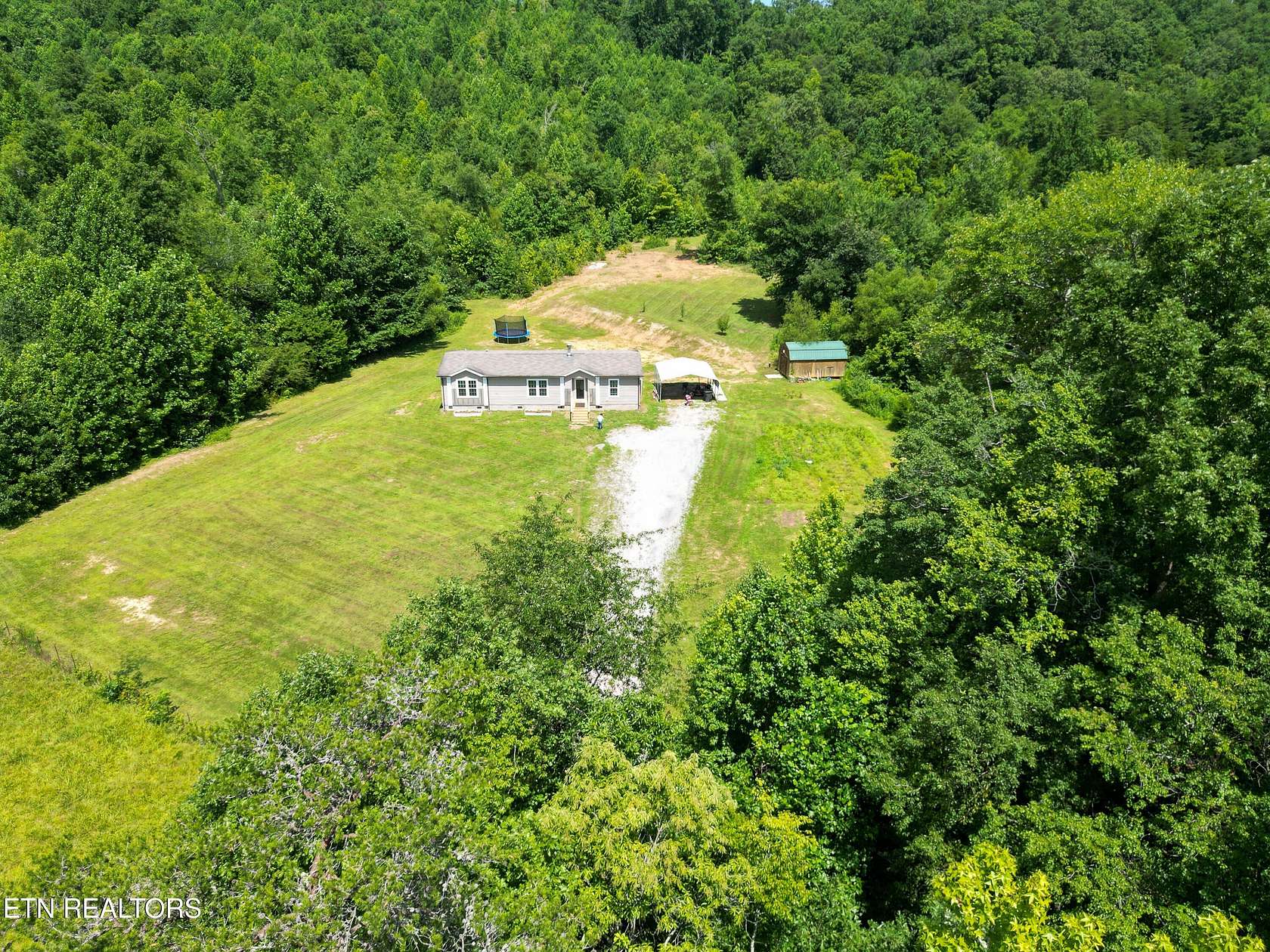 43.8 Acres of Land with Home for Sale in Philadelphia, Tennessee