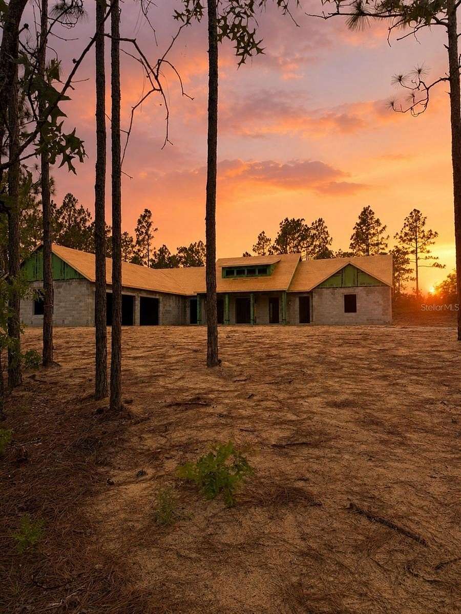 9.9 Acres of Land with Home for Sale in Morriston, Florida