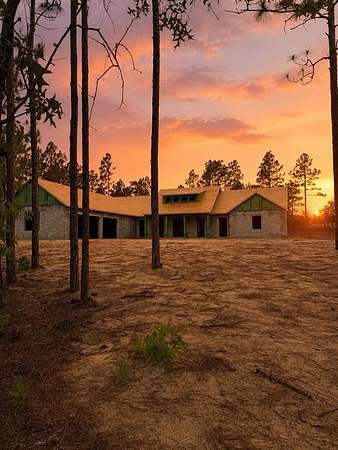 9.9 Acres of Land with Home for Sale in Morriston, Florida