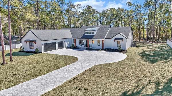 9.9 Acres of Land with Home for Sale in Morriston, Florida