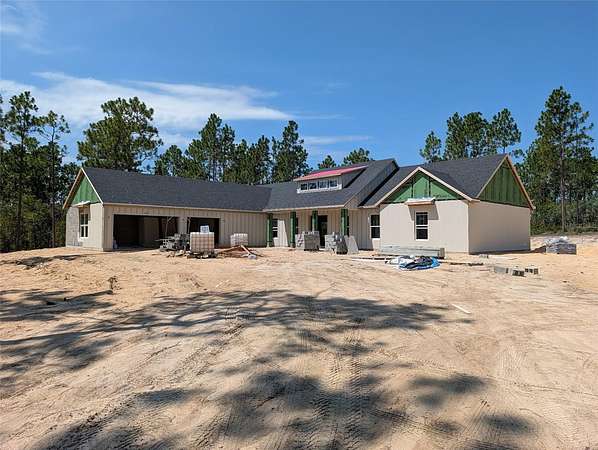 9.9 Acres of Land with Home for Sale in Morriston, Florida