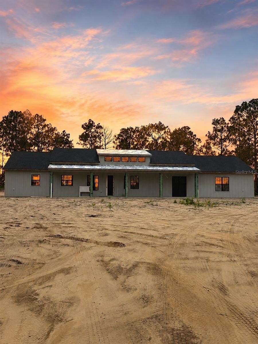 9 Acres of Land with Home for Sale in Morriston, Florida
