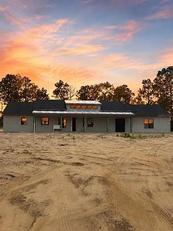 9 Acres of Land with Home for Sale in Morriston, Florida