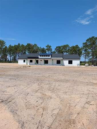 9 Acres of Land with Home for Sale in Morriston, Florida