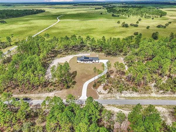 9 Acres of Land with Home for Sale in Morriston, Florida