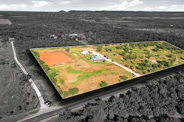 9.75 Acres of Land with Home for Sale in Merkel, Texas