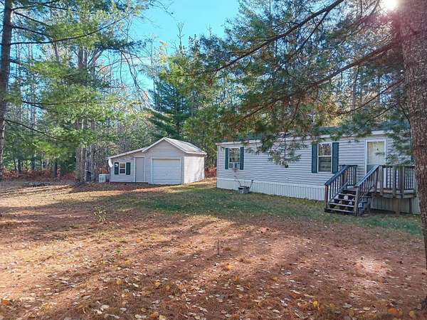 21 Acres of Recreational Land with Home for Sale in Vanderbilt, Michigan