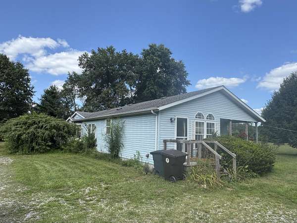 5 Acres of Land with Home for Sale in De Motte, Indiana
